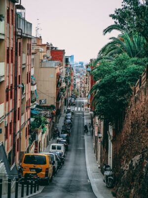 Captivating view of a vibrant street in Barcelona, highlighting urban architecture and everyday life.