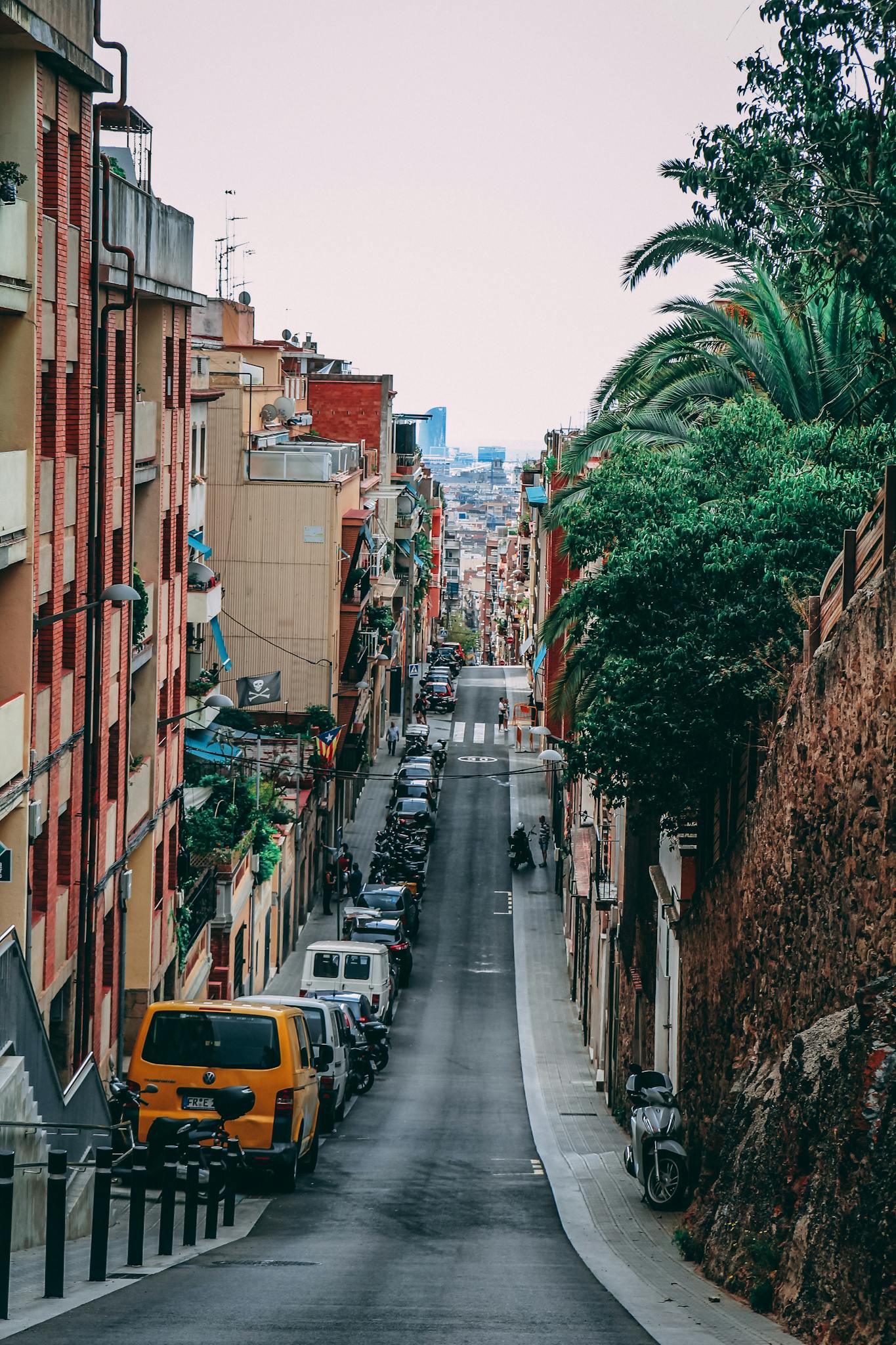 Captivating view of a vibrant street in Barcelona, highlighting urban architecture and everyday life.